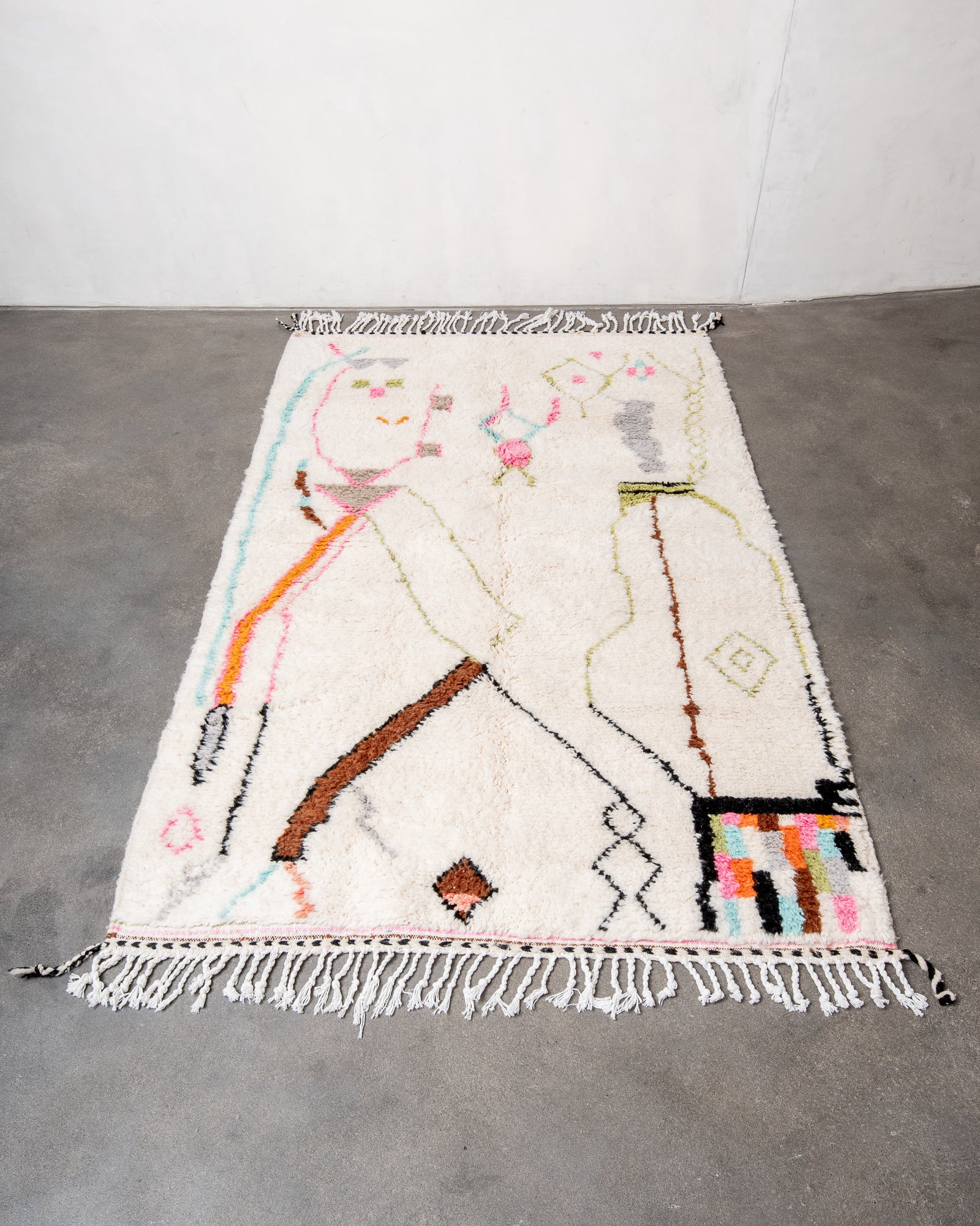 Modern, designer, handcrafted Berber rug from Morocco. Beniourain carpet with beautiful colours and patterns and fluffy wool texture.